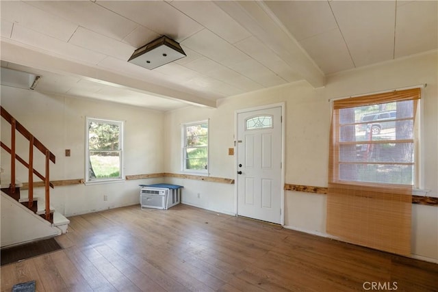 29219 Lyon Dr, Cedar Glen, CA 92321 - entryway featuring beamed ceiling, wood-type flooring, stairway, and a wall mounted air conditioner