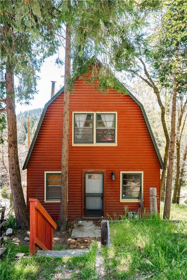 29219 Lyon Dr, Cedar Glen, CA 92321 - rear view of house with a gambrel roof