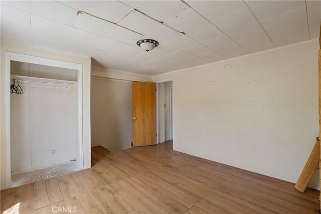 29219 Lyon Dr, Cedar Glen, CA 92321 - unfurnished bedroom with wood finished floors and a closet