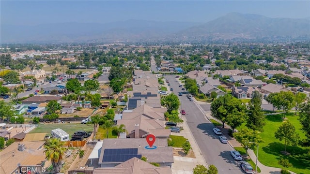 7404 Marshall Ct, Highland, CA 92346 - aerial perspective of suburban area with a mountainous background