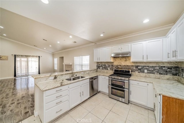 7404 Marshall Ct, Highland, CA 92346 - kitchen with stainless steel appliances, under cabinet range hood, a peninsula, ornamental molding, and tasteful backsplash