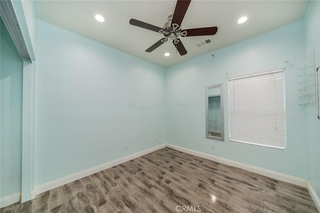 7404 Marshall Ct, Highland, CA 92346 - unfurnished room with wood finished floors, a ceiling fan, baseboards, and recessed lighting