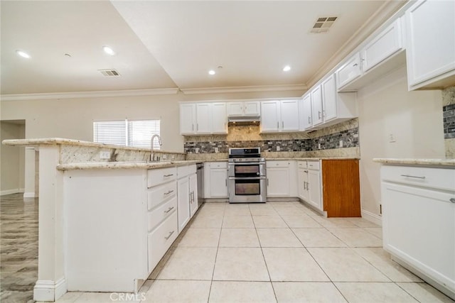 7404 Marshall Ct, Highland, CA 92346 - kitchen featuring stainless steel appliances, crown molding, decorative backsplash, under cabinet range hood, and light stone counters