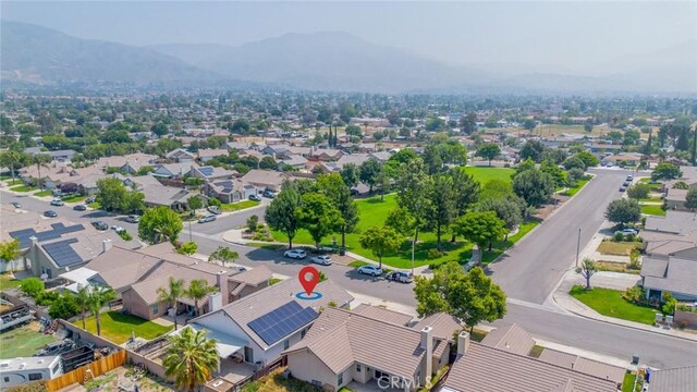 7404 Marshall Ct, Highland, CA 92346 - aerial perspective of suburban area with mountains