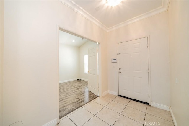 7404 Marshall Ct, Highland, CA 92346 - foyer with ornamental molding, baseboards, and light tile patterned floors