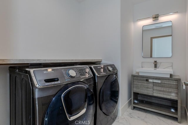 35242 Vista De Todo, Dana Point, CA 92624 - laundry area featuring independent washer and dryer, marble finish floors, and baseboards
