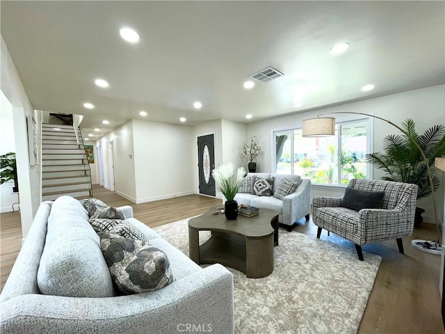 1616 Orchard Hill Ln, Hacienda Heights, CA 91745 - living area with baseboards, recessed lighting, stairway, and wood finished floors