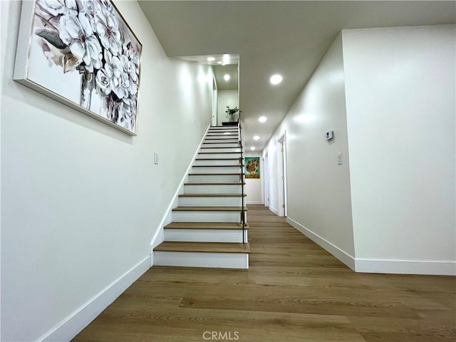 1616 Orchard Hill Ln, Hacienda Heights, CA 91745 - stairway with recessed lighting, baseboards, and wood finished floors