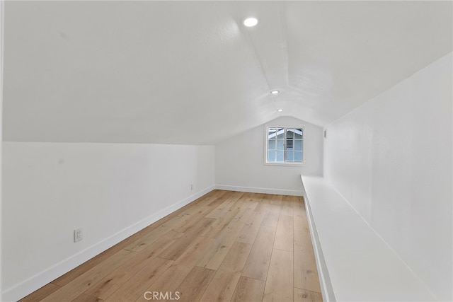 19617 Enslow Dr, Carson, CA 90746 - additional living space featuring lofted ceiling, baseboards, light wood-style floors, and recessed lighting
