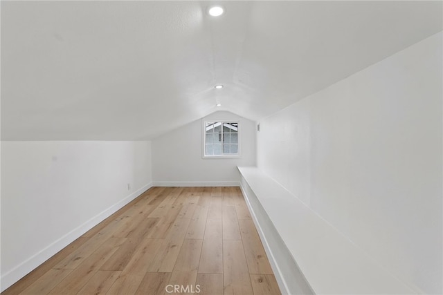 19617 Enslow Dr, Carson, CA 90746 - bonus room featuring lofted ceiling, light wood finished floors, baseboards, and recessed lighting