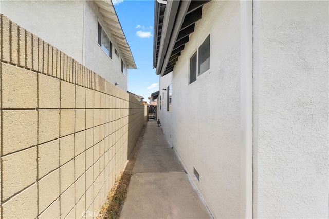 19617 Enslow Dr, Carson, CA 90746 - view of home's exterior featuring stucco siding and fence