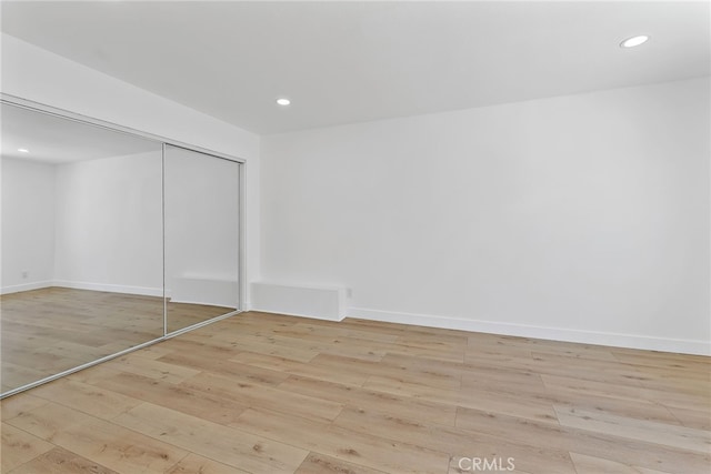 19617 Enslow Dr, Carson, CA 90746 - unfurnished bedroom featuring wood finished floors, recessed lighting, a closet, and baseboards