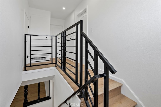 19617 Enslow Dr, Carson, CA 90746 - stairway featuring baseboards, recessed lighting, and wood finished floors