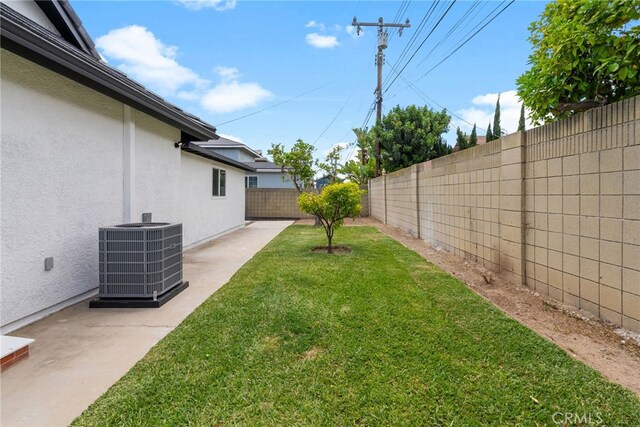 19617 Enslow Dr, Carson, CA 90746 - view of yard featuring central air condition unit and a patio area