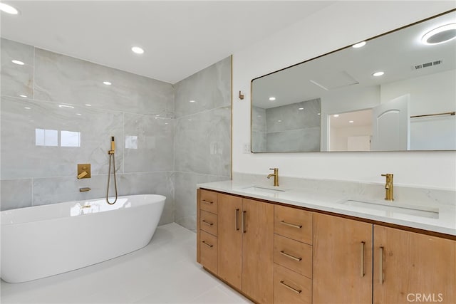 19617 Enslow Dr, Carson, CA 90746 - full bathroom with a soaking tub, double vanity, tile patterned flooring, and recessed lighting