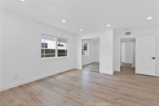 19617 Enslow Dr, Carson, CA 90746 - unfurnished bedroom with light wood-style floors, recessed lighting, baseboards, and a closet