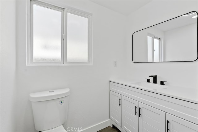 19617 Enslow Dr, Carson, CA 90746 - bathroom featuring plenty of natural light, vanity, and toilet