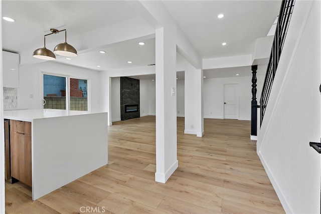 19617 Enslow Dr, Carson, CA 90746 - kitchen with modern cabinets, light wood-type flooring, light countertops, decorative light fixtures, and recessed lighting