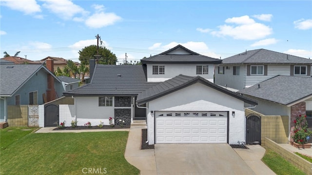 19617 Enslow Dr, Carson, CA 90746 - view of front of property featuring a gate, stucco siding, driveway, and a garage