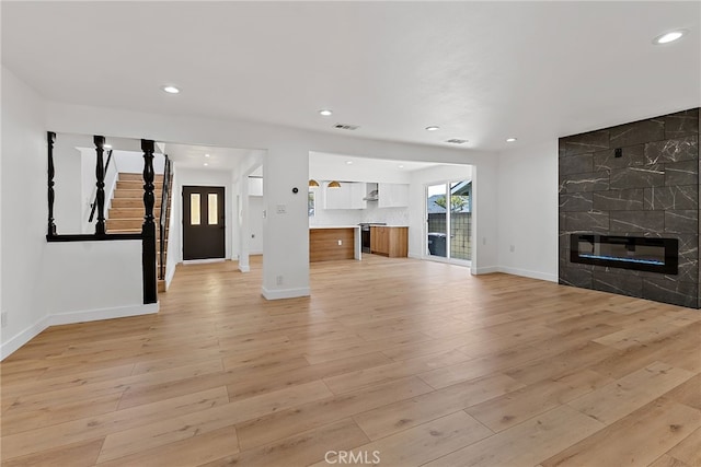 19617 Enslow Dr, Carson, CA 90746 - unfurnished living room with a fireplace, recessed lighting, light wood finished floors, and baseboards