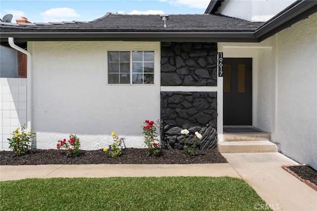 19617 Enslow Dr, Carson, CA 90746 - doorway to property featuring stone siding and stucco siding
