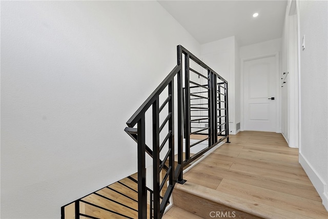 19617 Enslow Dr, Carson, CA 90746 - stairs featuring wood finished floors, recessed lighting, and baseboards