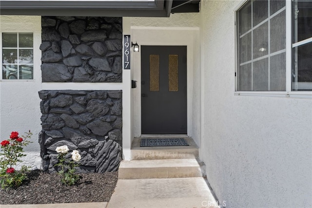 19617 Enslow Dr, Carson, CA 90746 - entrance to property with stucco siding and stone siding