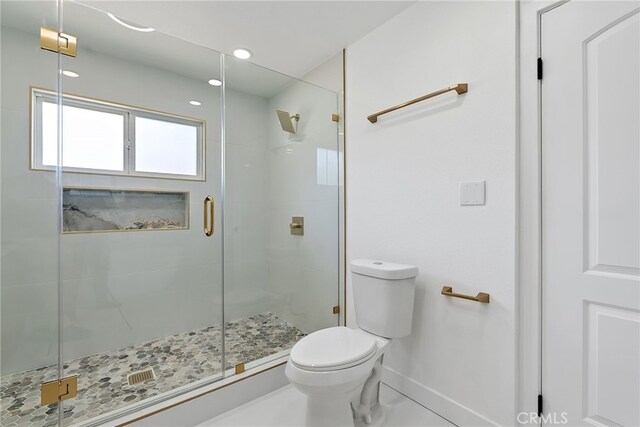 19617 Enslow Dr, Carson, CA 90746 - bathroom with toilet, a shower stall, and baseboards