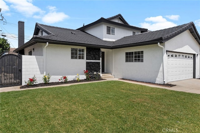 19617 Enslow Dr, Carson, CA 90746 - traditional home featuring an attached garage, stucco siding, a gate, and a front yard