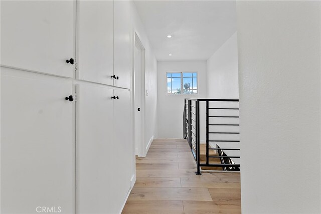 19617 Enslow Dr, Carson, CA 90746 - hallway featuring an upstairs landing, light wood-type flooring, recessed lighting, and baseboards