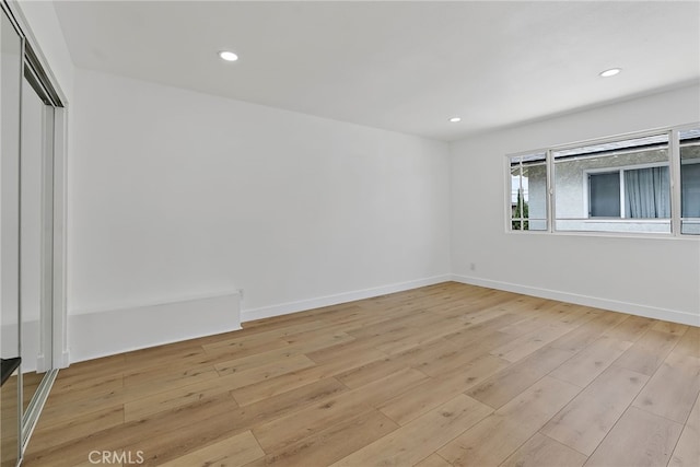 19617 Enslow Dr, Carson, CA 90746 - unfurnished room with light wood-style flooring, recessed lighting, and baseboards
