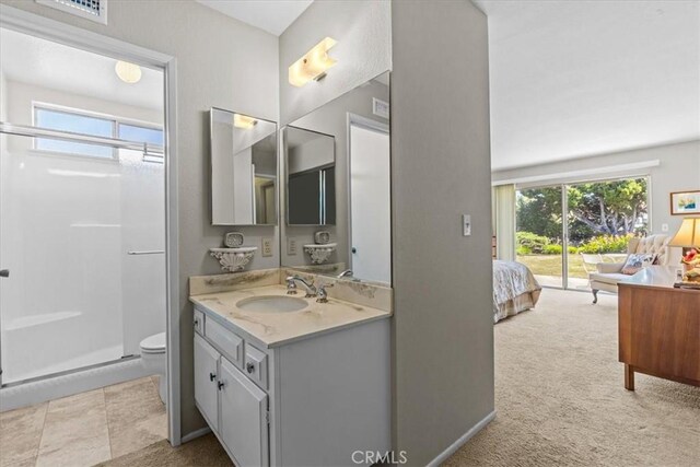 2015 E Hillman Cir, Orange, CA 92867 - ensuite bathroom with a stall shower, vanity, and toilet