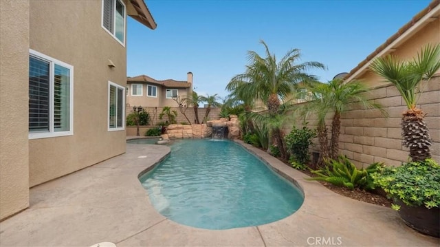 13819 Dogwood Ave, Chino, CA 91710 - view of swimming pool with a fenced backyard
