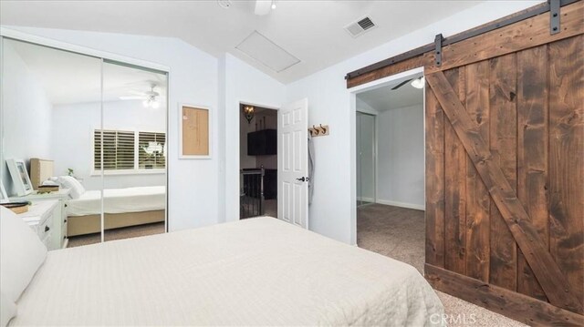 13819 Dogwood Ave, Chino, CA 91710 - bedroom featuring lofted ceiling, a barn door, ceiling fan, carpet floors, and baseboards