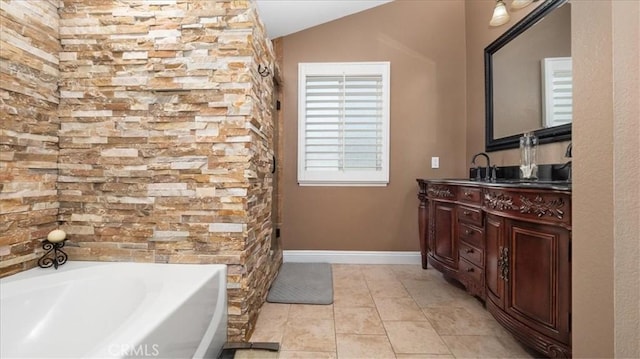 13819 Dogwood Ave, Chino, CA 91710 - full bathroom with a garden tub, vaulted ceiling, vanity, baseboards, and tile patterned floors