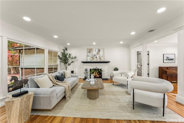 4428 Saugus Ave, Sherman Oaks, CA 91403 - living room with crown molding, wood finished floors, recessed lighting, and a fireplace