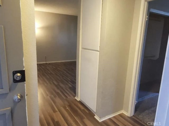 2805 W W Ave K12, Unit 143, Lancaster, CA 93536 - hall featuring wood finished floors and baseboards