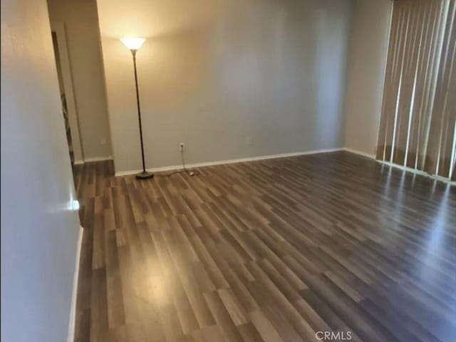 2805 W W Ave K12, Unit 143, Lancaster, CA 93536 - spare room featuring wood finished floors and baseboards