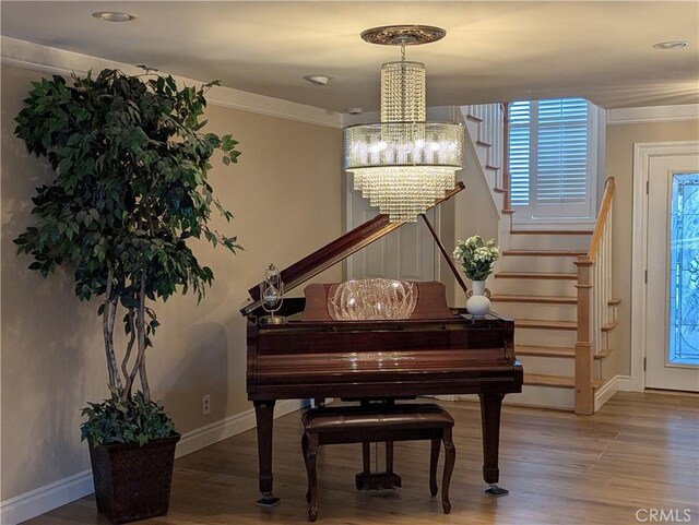 306 Vista Trucha, Newport Beach, CA 92660 - sitting room with stairway, a chandelier, wood finished floors, ornamental molding, and baseboards