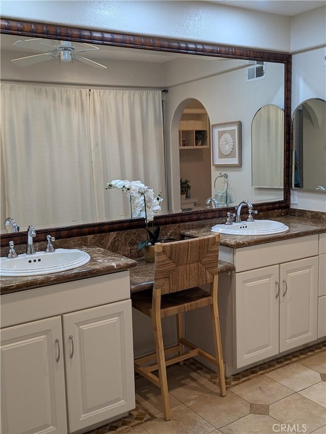 306 Vista Trucha, Newport Beach, CA 92660 - full bathroom with ceiling fan, tile patterned floors, and two vanities