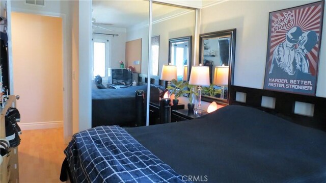 306 Vista Trucha, Newport Beach, CA 92660 - bedroom with crown molding, wood finished floors, and baseboards