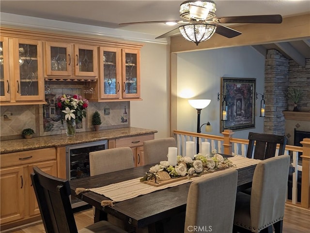306 Vista Trucha, Newport Beach, CA 92660 - dining room with a ceiling fan, light wood finished floors, beverage cooler, and a dry bar