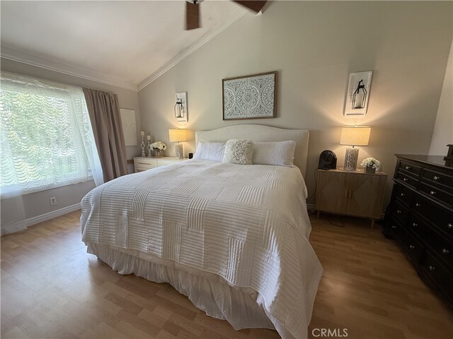306 Vista Trucha, Newport Beach, CA 92660 - bedroom featuring vaulted ceiling, crown molding, and light wood-style floors
