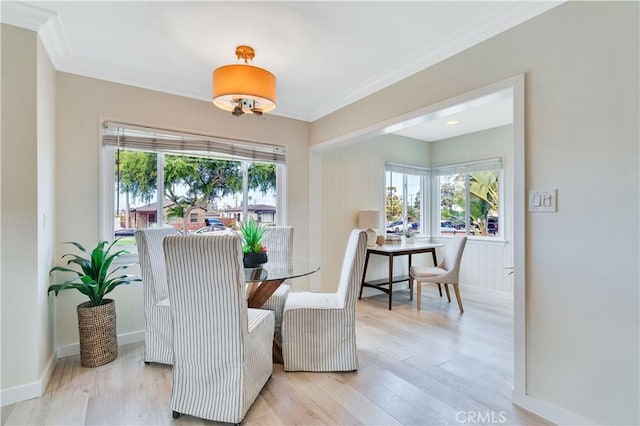 524 N Paulina Ave, Redondo Beach, CA 90277 - dining area featuring wood finished floors, ornamental molding, and baseboards