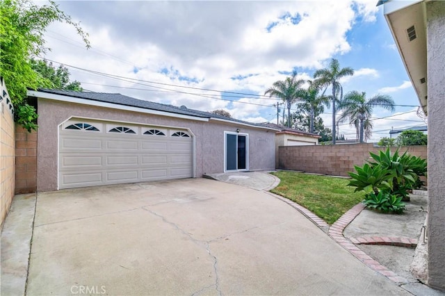 524 N Paulina Ave, Redondo Beach, CA 90277 - view of front of home with stucco siding, a garage, and fence