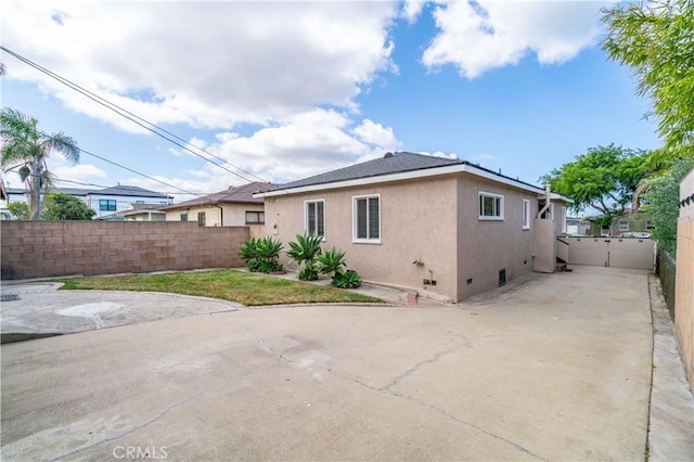 524 N Paulina Ave, Redondo Beach, CA 90277 - rear view of property with stucco siding, fence, and a patio area