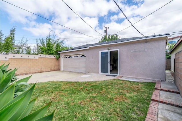 524 N Paulina Ave, Redondo Beach, CA 90277 - back of house with stucco siding, a patio, and driveway