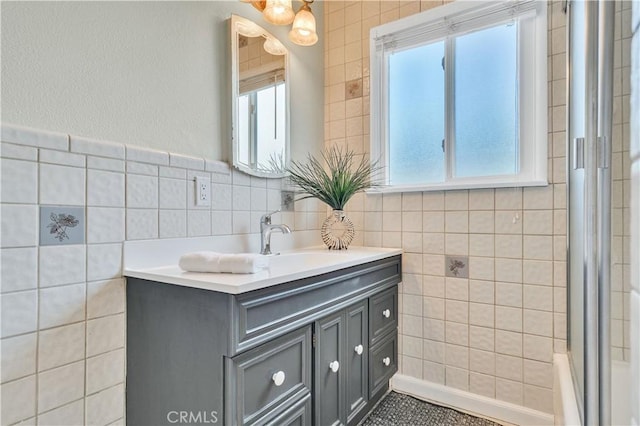 524 N Paulina Ave, Redondo Beach, CA 90277 - bathroom with tile walls, vanity, and healthy amount of natural light