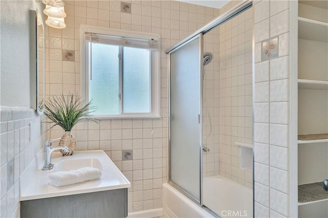 524 N Paulina Ave, Redondo Beach, CA 90277 - bathroom with tile walls, shower / bath combination with glass door, and vanity