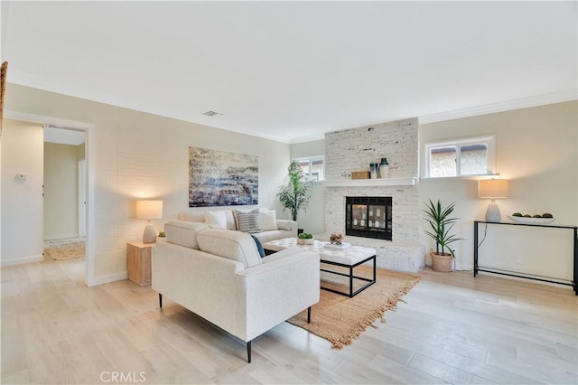 524 N Paulina Ave, Redondo Beach, CA 90277 - living room with wood finished floors, ornamental molding, a fireplace, and baseboards